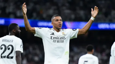 Kylian Mbappe celebrates his first Champions League goal with Real Madrid
