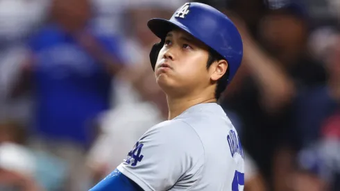 Shohei Ohtani #17 of the Los Angeles Dodgers hits a two-run home run, his 50th of the season, during the seventh inning against the Miami Marlins at loanDepot park on September 19, 2024 in Miami, Florida. 
