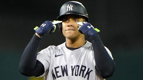 Juan Soto #22 of the New York Yankees stands on second base as he celebrates a pinch-hit RBI double scoring Oswaldo Cabrera #95 (not in the image) against the Oakland Athletics in the top of the 10th inning at the Oakland Coliseum on September 20, 2024 in Oakland, California.
