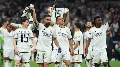 Players of Real Madrid celebrate led by Nacho Fernandez (2) after the team's victory and reaching the UEFA Champions League Final
