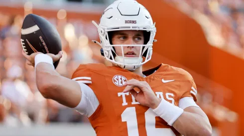 Arch Manning #16 of the Texas Longhorns warms up before the game against the Louisiana Monroe Warhawks at Darrell K Royal-Texas Memorial Stadium on September 21, 2024 in Austin, Texas.
