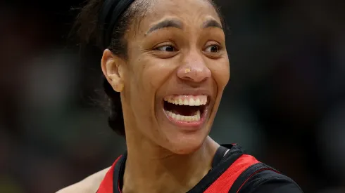 A'ja Wilson #22 of the Las Vegas Aces reacts during the fourth quarter against the Seattle Storm at Climate Pledge Arena on September 17, 2024 in Seattle, Washington.