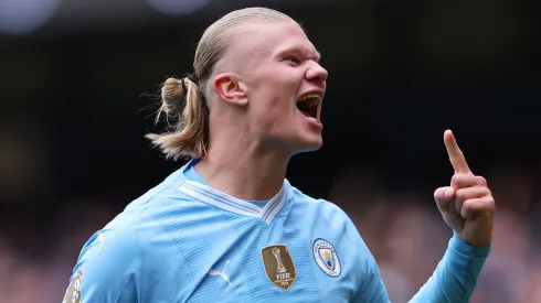 Erling Haaland of Manchester City celebrates scoring his team's first goal during the Premier League match between Manchester City and Everton FC at Etihad Stadium on February 10, 2024 in Manchester, England.
