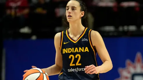 Caitlin Clark #22 of the Indiana Fever advances the ball during the second half of a first-round WNBA playoff game against the Connecticut Sun at Mohegan Sun Arena on September 22, 2024 in Uncasville, Connecticut. The Sun defeated the Fever 93-69.