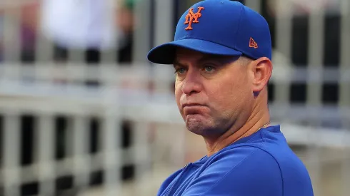 Manager Carlos Mendoza #64 of the New York Mets looks on prior to the game against the Atlanta Braves at Truist Park on September 24, 2024 in Atlanta, Georgia.