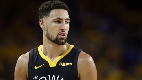 Klay Thompson #11 of the Golden State Warriors reacts against the Toronto Raptors in the first half during Game Six of the 2019 NBA Finals
