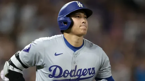 Shohei Ohtani #17 of the Los Angels Dodgers circles the bases after hitting a three RBI home run against the Colorado Rockies in the sixth inning at Coors Field on September 27, 2024 in Denver, Colorado.
