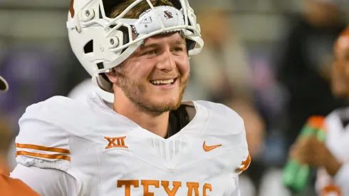 Texas Longhorns quarterback Quinn Ewers (3) warms up before the NCAA, College League, USA Football game between the Texas Longhorns and TCU Horned Frogs at Amon G. Carter Stadium in Fort Worth, Texas.