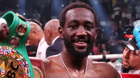 Terence Crawford celebrates with his championship belts after defeating Errol Spence Jr. in the World Welterweight Championship bout at T-Mobile Arena on July 29, 2023 in Las Vegas, Nevada.