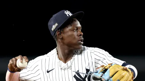 Jazz Chisholm Jr. #13 of the New York Yankees fields the ball against the Kansas City Royals during the seventh inning in Game One of the Division Series at Yankee Stadium on October 05, 2024 in New York City. 
