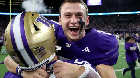 Will Rogers #7 of the Washington Huskies celebrates after beating Michigan Wolverines at Husky Stadium on October 05, 2024 in Seattle, Washington.