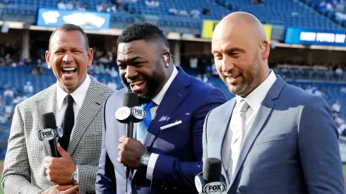 Former MLB players (L-R) Alex Rodriguez, David Ortiz and Derek Jeter have a laugh during the television pre game show before a game between the New York Yankees and the Los Angeles Dodgers at Yankee Stadium on June 08, 2024 in New York City.
