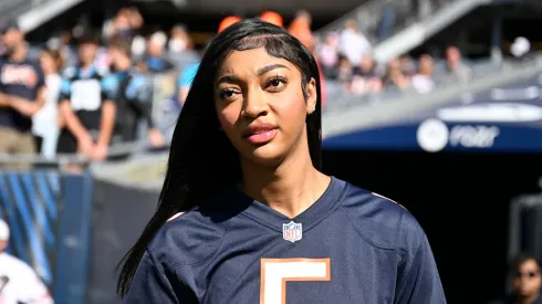 Angel Reese of the Chicago Sky looks on before the game between the Carolina Panthers and the Chicago Bears
