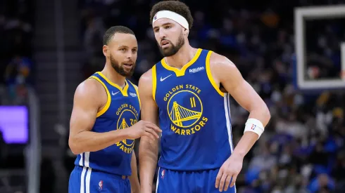 Klay Thompson #11 and Stephen Curry #30 of the Golden State Warriors talks with each other against Indiana Pacers
