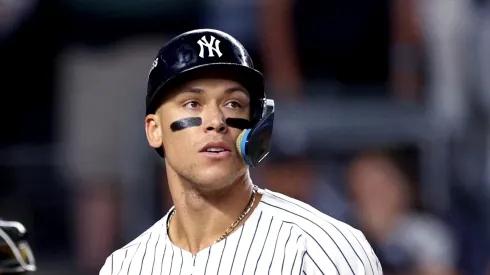 Aaron Judge #99 of the New York Yankees reacts after striking out against the Kansas City Royals during the first inning in Game One of the Division Series at Yankee Stadium on October 05, 2024 in New York City.
