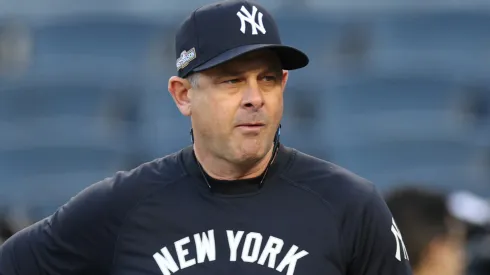 Manager Aaron Boone #17 of the New York Yankees looks on during batting practice prior to Game Two of the Division Series against the Kansas City Royals at Yankee Stadium on October 07, 2024 in New York City.
