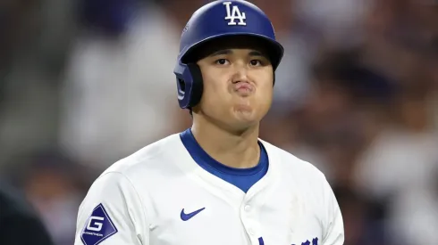 Shohei Ohtani #17 of the Los Angeles Dodgers reacts after striking out in the eighth inning against the San Diego Padres during Game Two of the Division Series at Dodger Stadium on October 06, 2024 in Los Angeles, California. 
