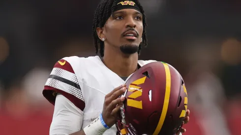 Quarterback Jayden Daniels #5 of the Washington Commanders during the NFL game at State Farm Stadium on September 29, 2024 in Glendale, Arizona. The Commanders defeated the Cardinals 42-14.
