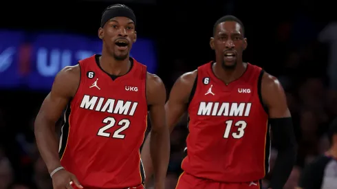 Jimmy Butler #22 and Bam Adebayo #13 of the Miami Heat celebrate in the second half of game one of the Eastern Conference Semifinals against the New York Knicks at Madison Square Garden on April 30, 2023 in New York City. The Miami Heat defeated the New York Knicks 108-101.
