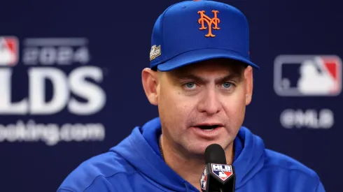 Manager Carlos Mendoza of the New York Mets speaks to the media during a press conference before Game Three of the Division Series against the Philadelphia Phillies at Citi Field on October 08, 2024 in the Queens borough of New York City.