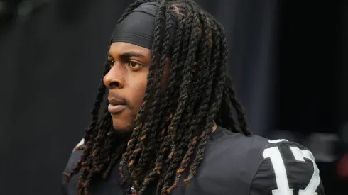 Wide receiver Davante Adams #17 of the Las Vegas Raiders walks onto the field before a preseason game against the Minnesota Vikings at Allegiant Stadium on August 14, 2022 in Las Vegas, Nevada.
