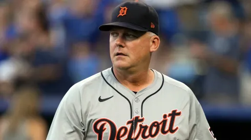 Manager A.J. Hinch #14 of the Detroit Tigers walks back to the dugout after delivering the starting lineup prior to a game against the Kansas City Royals at Kauffman Stadium on September 16, 2024 in Kansas City, Missouri. 
