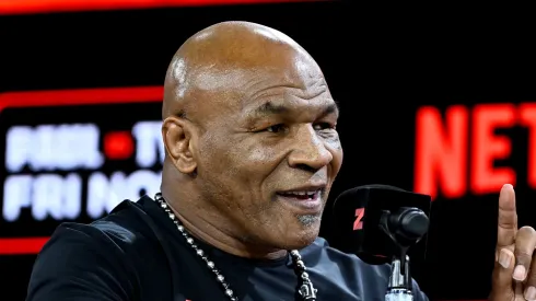 Mike Tyson (L) and Jake Paul face off at an exclusive press conference ahead of their November bout during the Fanatics Fest NYC 2024 at Jacob Javits Center on August 18, 2024 in New York City.