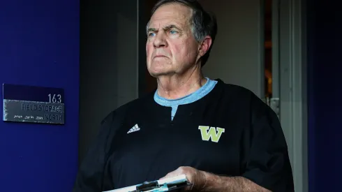 Bill Belichick, former NFL coach, looks on during the game between the Washington Huskies and the Michigan Wolverines at Husky Stadium on October 05, 2024 in Seattle, Washington.
