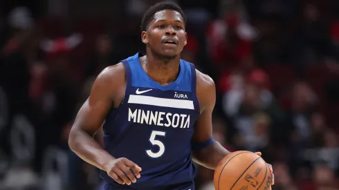 Anthony Edwards #5 of the Minnesota Timberwolves dribbles up the court against the Chicago Bulls 
