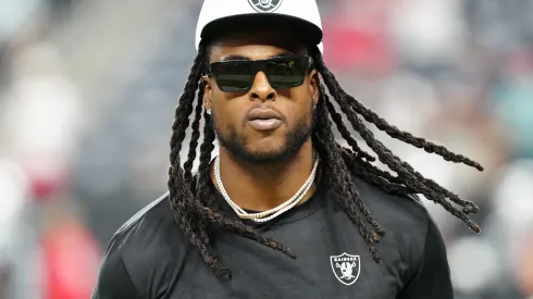 Wide receiver Davante Adams #17 of the Las Vegas Raiders walks on the field before a preseason game against the San Francisco 49ers at Allegiant Stadium on August 23, 2024 in Las Vegas, Nevada.
