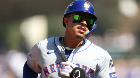 Mark Vientos #27 of the New York Mets runs the bases after hitting a grand-slam home run to take a 6-0 lead against the Los Angeles Dodgers in the second inning during Game Two of the Championship Series at Dodger Stadium on October 14, 2024 in Los Angeles, California. 
