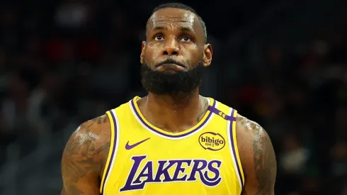 LeBron James #23 of the Los Angeles Lakers walks backcourt during a preseason game against the Milwaukee Bucks at Fiserv Forum on October 10, 2024 in Milwaukee, Wisconsin. 
