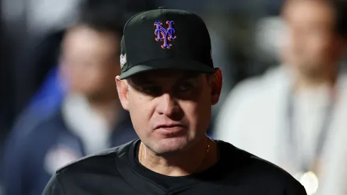 Manager Carlos Mendoza of the New York Mets walks through the dugout before Game Three of the National League Championship Series against the Los Angeles Dodgers at Citi Field on October 16, 2024 in New York City. 
