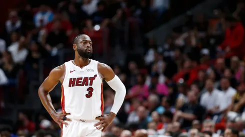 Dwyane Wade #3 of the Miami Heat looks on against the Philadelphia 76ers during the first half at American Airlines Arena on April 09, 2019 in Miami, Florida. 
