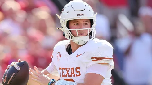 Quinn Ewers #3 of the Texas Longhorns throws the ball during the second quarter against the Oklahoma Sooners at Cotton Bowl Stadium on October 12, 2024 in Dallas, Texas
