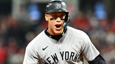 : Aaron Judge #99 of the New York Yankees reacts after Giancarlo Stanton #27 hit a three-run home run in the sixth inning during Game Four of the American League Championship Series at Progressive Field on October 18, 2024 in Cleveland, Ohio. 
