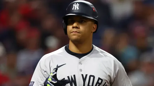 Juan Soto #22 of the New York Yankees reacts after being walked in the sixth inning against the Cleveland Guardians during Game Four of the American League Championship Series at Progressive Field on October 18, 2024 in Cleveland, Ohio.
