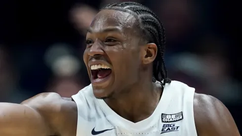  Quincy Olivari #8 of the Xavier Musketeers celebrates after making a shot in the second half against the Seton Hall Pirates at the Cintas Center.
