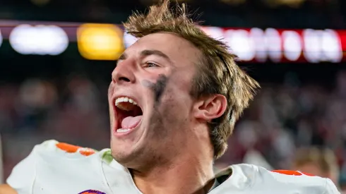 Cade Klubnik #2 of the Clemson Tigers celebrates after defeating the South Carolina Gamecocks during their game at Williams-Brice Stadium on November 25, 2023 in Columbia, South Carolina.
