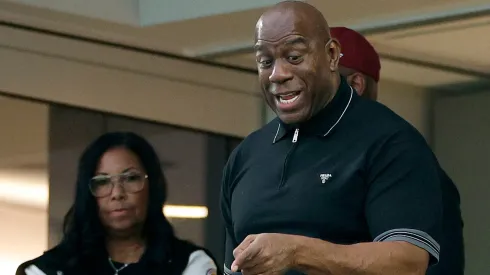 Minority Owner Magic Johnson of the Washington Commanders with wife Cookie Johnson react during the game against the Los Angeles Rams at SoFi Stadium on December 17, 2023 in Inglewood, California.
