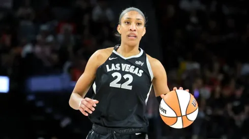 A'ja Wilson #22 of the Las Vegas Aces brings the ball up the court against the New York Liberty
