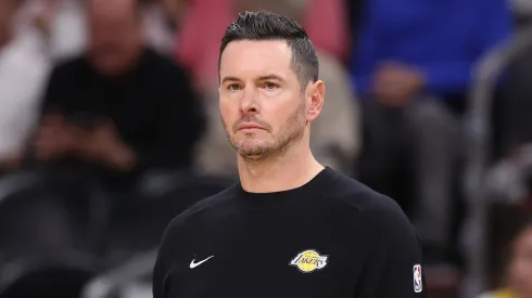 Head coach JJ Redick of the Los Angeles Lakers looks on during the first half of the preseason NBA game against the Phoenix Suns at Footprint Center on October 17, 2024 in Phoenix, Arizona.
