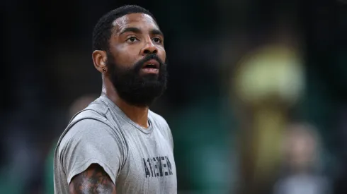 Kyrie Irving #11 of the Dallas Mavericks warms up before Game Five of the 2024 NBA Finals
