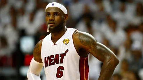 LeBron James #6 of the Miami Heat looks on against the San Antonio Spurs during Game Three of the 2014 NBA Finals
