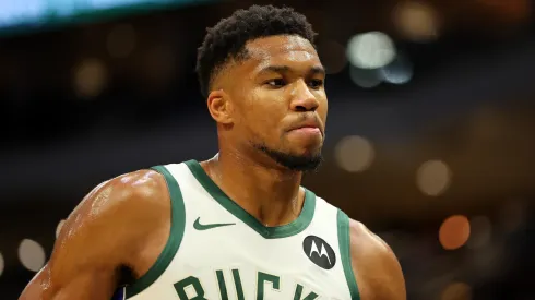 Giannis Antetokounmpo #34 of the Milwaukee Bucks walks backcourt during a preseason game against the Los Angeles Lakers
