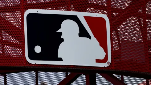 A MLB logo is seen before a game between the Oakland Athletics and the Los Angeles Angels at Angel Stadium of Anaheim on May 22, 2022 in Anaheim, California. 
