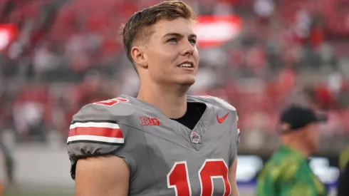 Quarterback Will Howard #18 of the Ohio State Buckeyes walks off the field after the game against the Iowa Hawkeyes at Ohio Stadium on October 05, 2024 in Columbus, Ohio.
