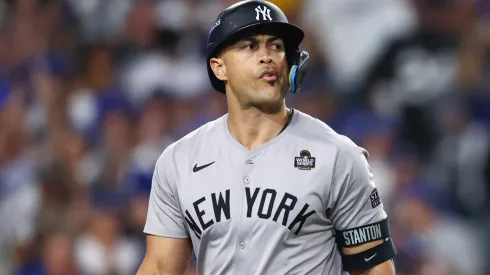 Giancarlo Stanton #27 of the New York Yankees reacts after striking out in the seventh inning against the Los Angeles Dodgers during Game One of the 2024 World Series at Dodger Stadium on October 25, 2024 in Los Angeles, California. 
