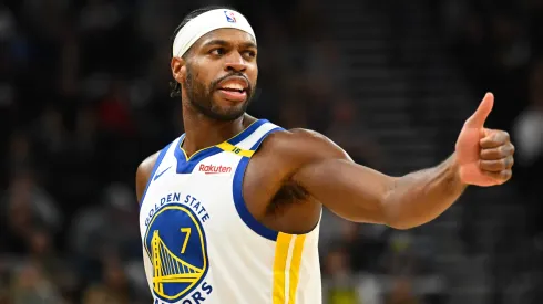 Buddy Hield #7 of the Golden State Warriors motions to a teammate during the second half of a game against the Utah Jazz at Delta Center on October 25, 2024 in Salt Lake City, Utah. 
