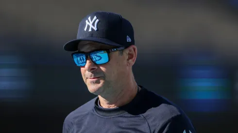 Manager Aaron Boone #17 of the New York Yankees looks on before playing against the Los Angeles Dodgers in Game Two of the 2024 World Series at Dodger Stadium on October 26, 2024 in Los Angeles, California.
